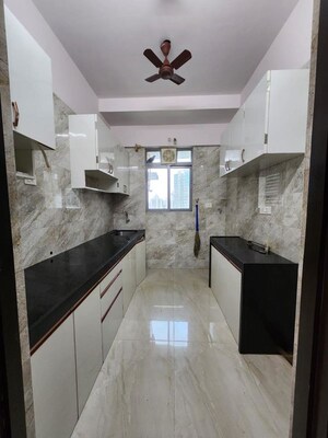 Kitchen in 3 BHK Apartment at Rajesh White City, Kandivali East – for Sale
