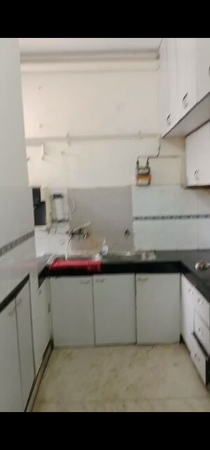 Kitchen in 4 BHK Villa at RWA Apartments Sector 30, Sector 30 – for Rent