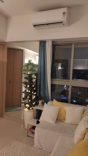 Living Room in 1 BHK Apartment at Lodha Unica, Jogeshwari West – for Sale