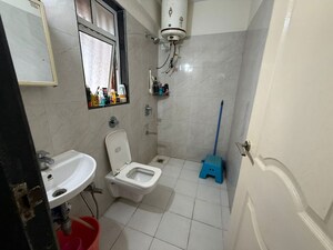 Bathroom in 3 BHK Apartment at Puranik Hometown, Ghodbunder Road – for Rent