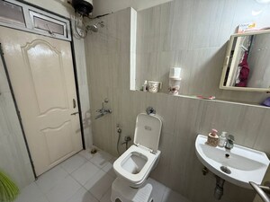 Bathroom in 3 BHK Apartment at Puranik Hometown, Ghodbunder Road – for Rent