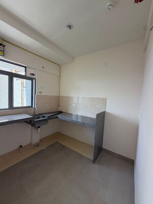 Kitchen in 1 BHK Apartment at Piramal Vaikunth, Balkum Pada – for Rent