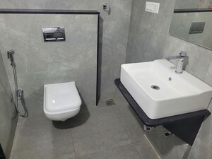 Bathroom in 2.5 BHK Apartment at Model Colony – for Rent