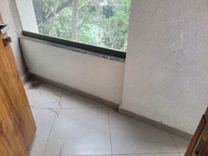 Balcony in 2.5 BHK Apartment at Model Colony – for Rent