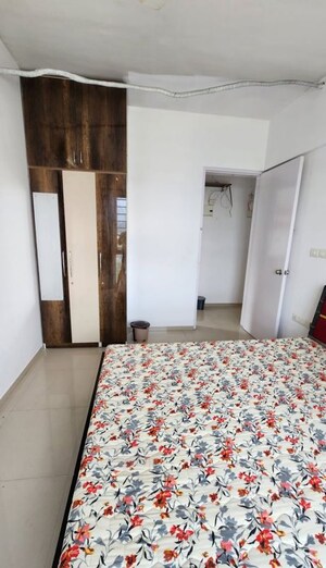 Bedroom in 3 BHK Apartment at Sheth Vasant Lawns, Laxmi Nagar – for Rent