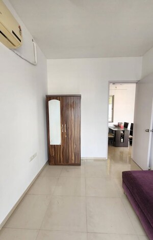 Bedroom in 3 BHK Apartment at Sheth Vasant Lawns, Laxmi Nagar – for Rent