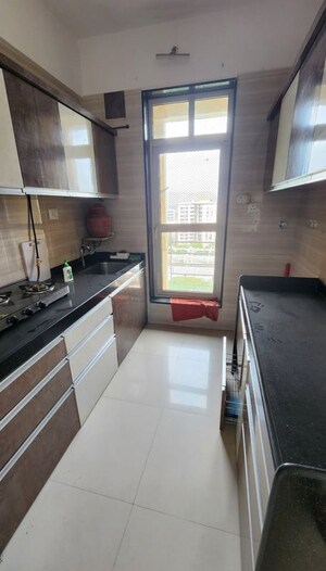 Kitchen in 3 BHK Apartment at Sheth Vasant Lawns, Laxmi Nagar – for Rent