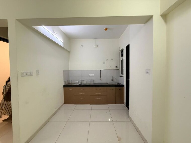 Kitchen, kolte-patil-life-republic-r-10 2 Bedroom 700 Sq.Ft. Apartment In Hinjewadi Pune 10649580