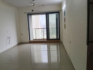 Room in 2 BHK Apartment at Rustomjee Elanza, Malad West – for Rent