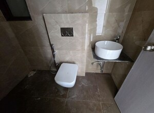 Bathroom in 2 BHK Apartment at Dhamji Shamji Mahavir Spring Tulip Phase 1, Pokhran Road No Two – for Rent