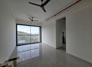 Living Room in 2 BHK Apartment at Dhamji Shamji Mahavir Spring Tulip Phase 1, Pokhran Road No Two – for Rent
