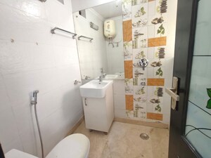 Bathroom in 3 BHK Apartment at Vasant Kunj – for Rent