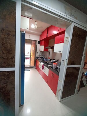 Kitchen in 2 BHK Apartment at Sadguru Paradise, Mira Road – for Sale