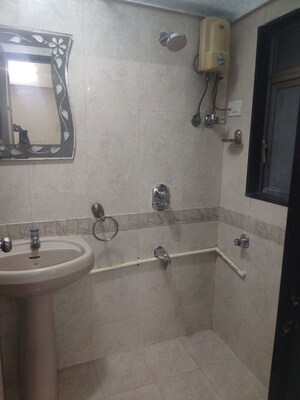 Bathroom in 3 BHK Apartment at Neha Heena Gaurav Jewels, Goregaon East – for Rent