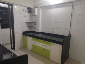 Kitchen in 3 BHK Apartment at Neha Heena Gaurav Jewels, Goregaon East – for Rent