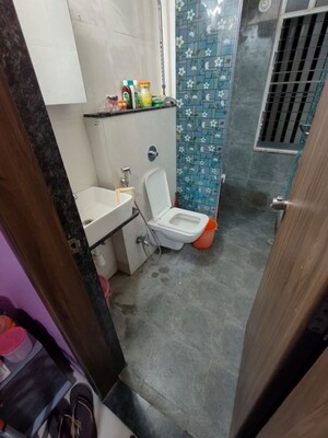 Bathroom in 3 BHK Apartment at Majestique Rhythm County, Handewadi – for Sale