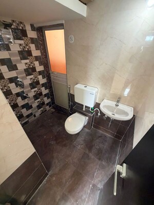 Bathroom in 1 BHK Apartment at Vedant Sumeet Elite, Balkum Pada – for Rent