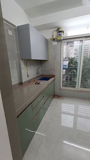 Kitchen in 2 BHK Apartment at Pratham Prerana CHS, Andheri West – for Rent