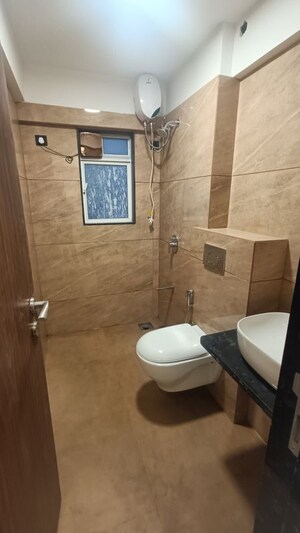 Bathroom in 2 BHK Apartment at Prarthana La Alteza, Andheri West – for Rent