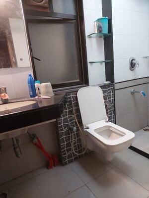 Bathroom in 3 BHK Apartment at Lakshachandi Heights, Goregaon East – for Rent
