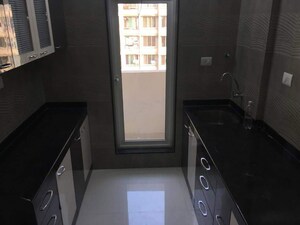 Kitchen in 2 BHK Apartment at Vasant Fiona, Pokhran Road No Two – for Rent