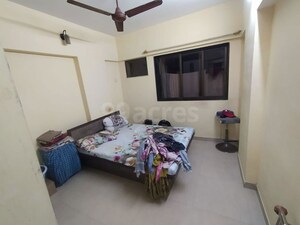 Bedroom in 2 BHK Apartment at Shah Arcade II, Malad East – for Rent