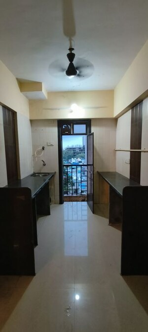 Kitchen in 2 BHK Apartment at Eksar – for Sale