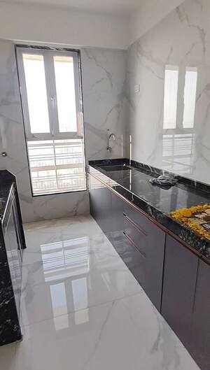 Kitchen in 1 BHK Apartment at Pramanik Walchand Paradise, Mira Road – for Sale