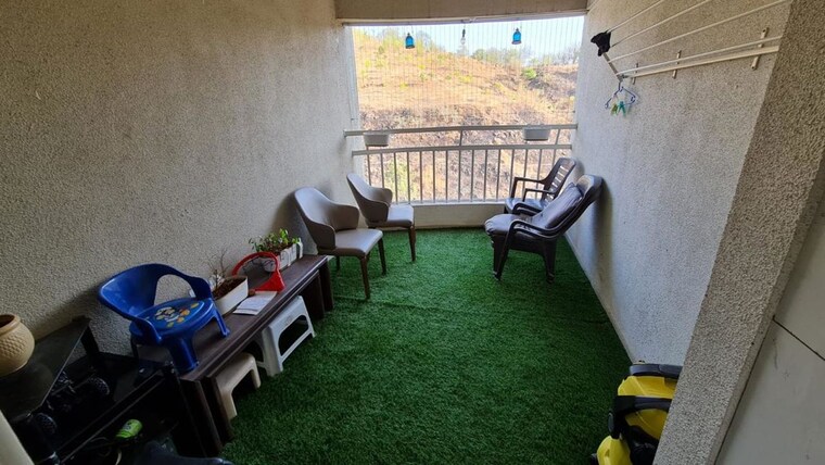 Living Room, blue-33-mayfair 2 Bedroom 920 Sq.Ft. Apartment In Balewadi Pune 10650128