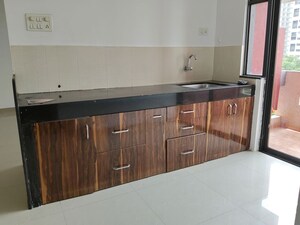 Kitchen in 2 BHK Apartment at Kumar Pebble Park, Hadapsar – for Rent