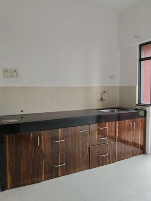 Kitchen in 2 BHK Apartment at Kumar Pebble Park, Hadapsar – for Rent