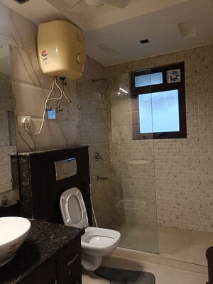 Bathroom in 4 BHK Builder Floor at East Of Kailash – for Rent