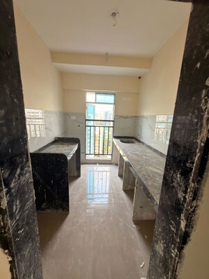 Building Lobby in 1 BHK Apartment at Siddha Sky, Sion – for Rent