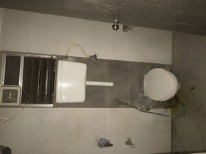 Bathroom in 2 BHK Apartment at Unique Poonam Estate Cluster 2, Mira Road – for Rent