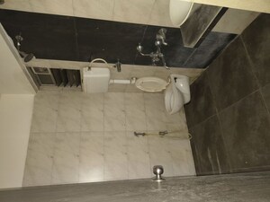 Bathroom in 2 BHK Apartment at Unique Poonam Estate Cluster 2, Mira Road – for Rent