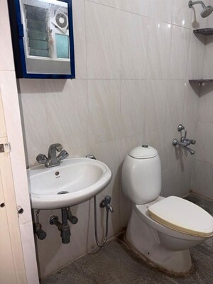 Bathroom in 2 BHK Apartment at Nri Layout – for Rent