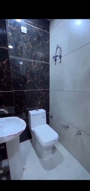 Bathroom in 3 BHK Builder Floor at Mohan Garden – for Sale