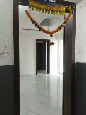 Building Lobby in 2 BHK Apartment at SS Rutuparna, Moshi – for Rent
