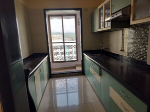 Kitchen in 2 BHK Apartment at Ambika Heights, Nerul – for Rent