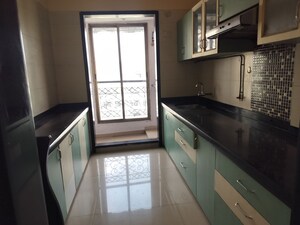 Kitchen in 2 BHK Apartment at Ambika Heights, Nerul – for Rent