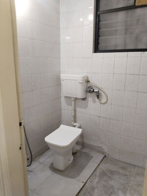 Bathroom in 2 BHK Apartment at Nina Apartments, Modi Colony – for Rent