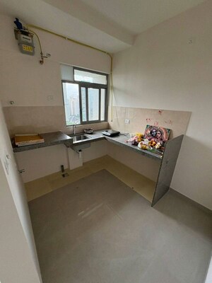 Kitchen in 1 BHK Apartment at Piramal Vaikunth, Balkum Pada – for Rent