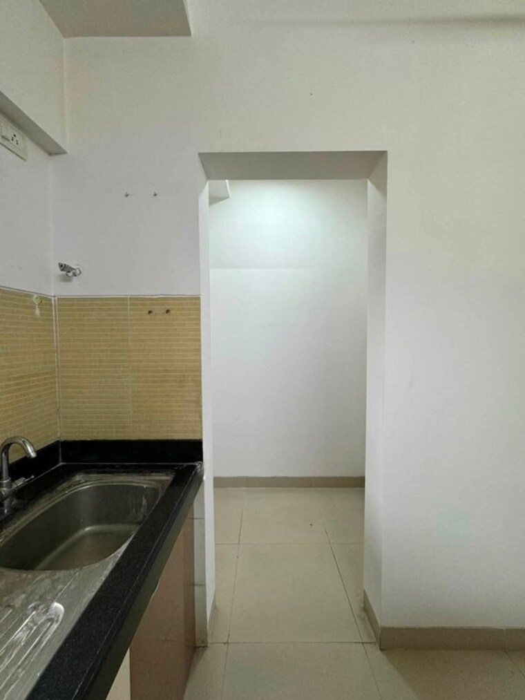 Kitchen, lodha-splendora 3 Bedroom 1124 Sq.Ft. Apartment In Ghodbunder Road Thane 10650436