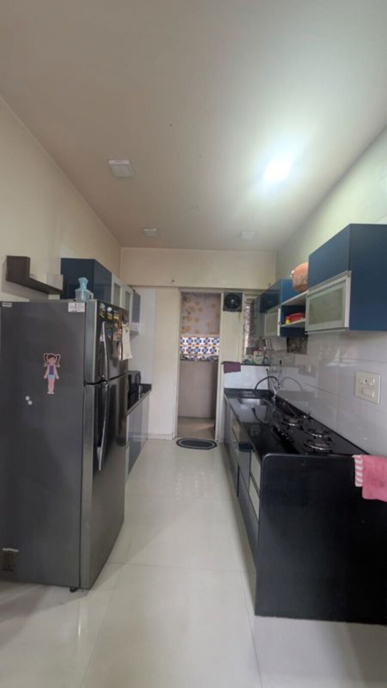 Kitchen, ganga-arcadia 2 Bedroom 950 Sq.Ft. Apartment In Kharadi Pune 10650503