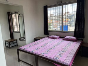 Bedroom in 3 BHK Apartment at Raichandani Megha Terrace CHS, Aundh – for Rent