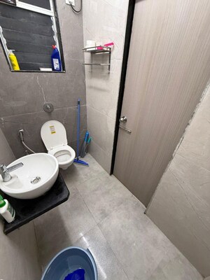 Bathroom in 2 BHK Apartment at Romell Diva, Malad West – for Rent