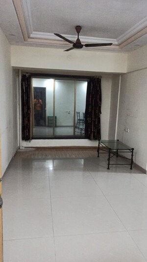 Room in 2 BHK Apartment at Romell Diva, Malad West – for Rent