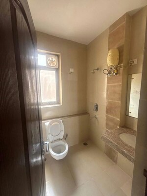 Bathroom in 2 BHK Apartment at Unitech Uniworld Gardens, Sector 47 – for Rent