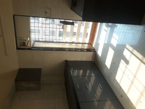 Kitchen in 3 BHK Apartment at Vinay Unique Gardens, Virar West – for Rent