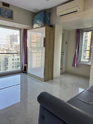 Living Room in 2 BHK Apartment at Prabhadevi – for Sale